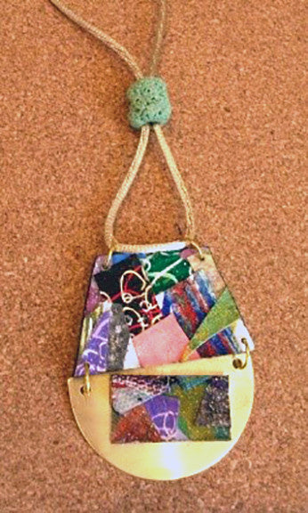 "Reversable Collage on Brass Necklace" by Anthea Louise Piszczuk